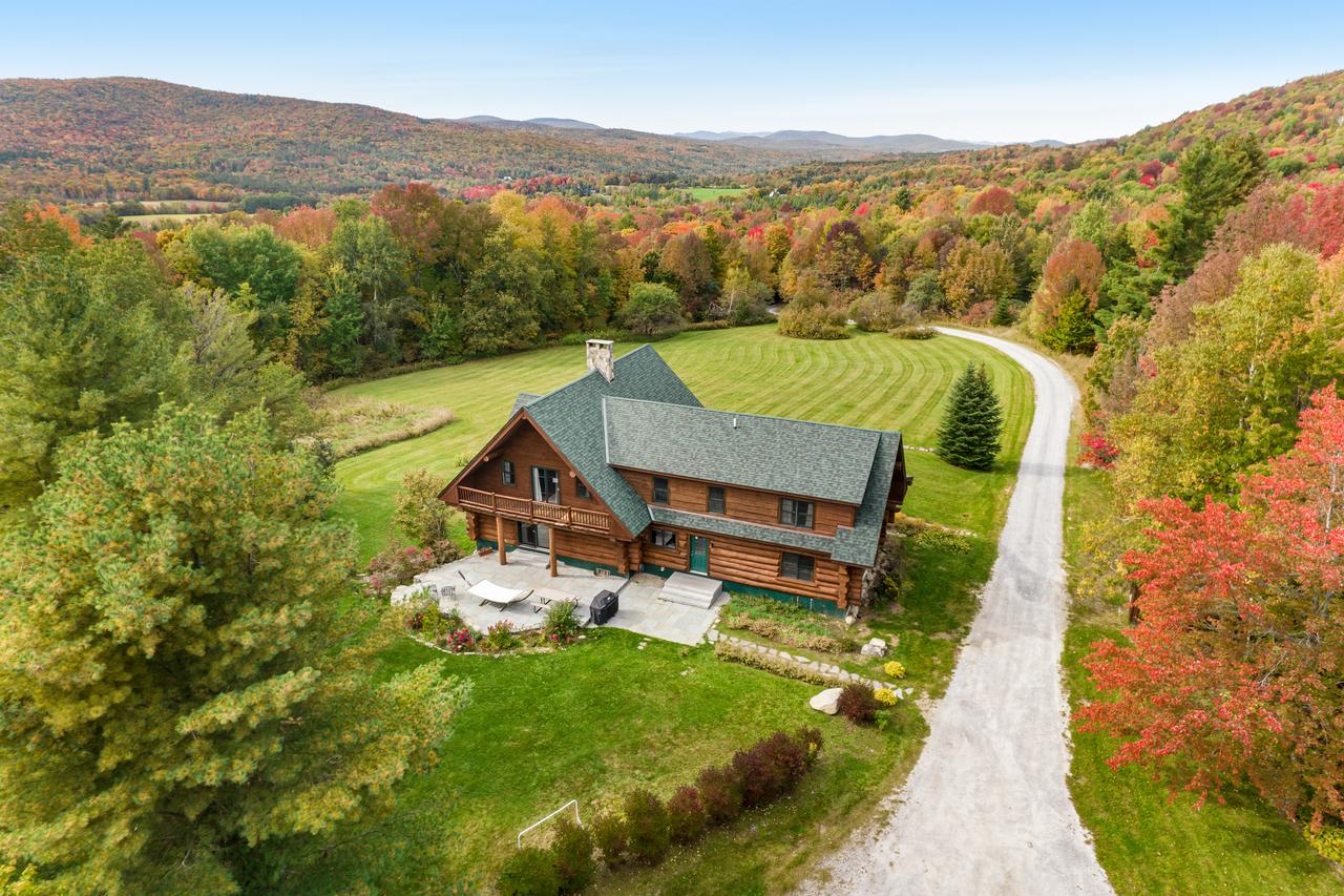 aerial view of cabin in vermont in the fall
