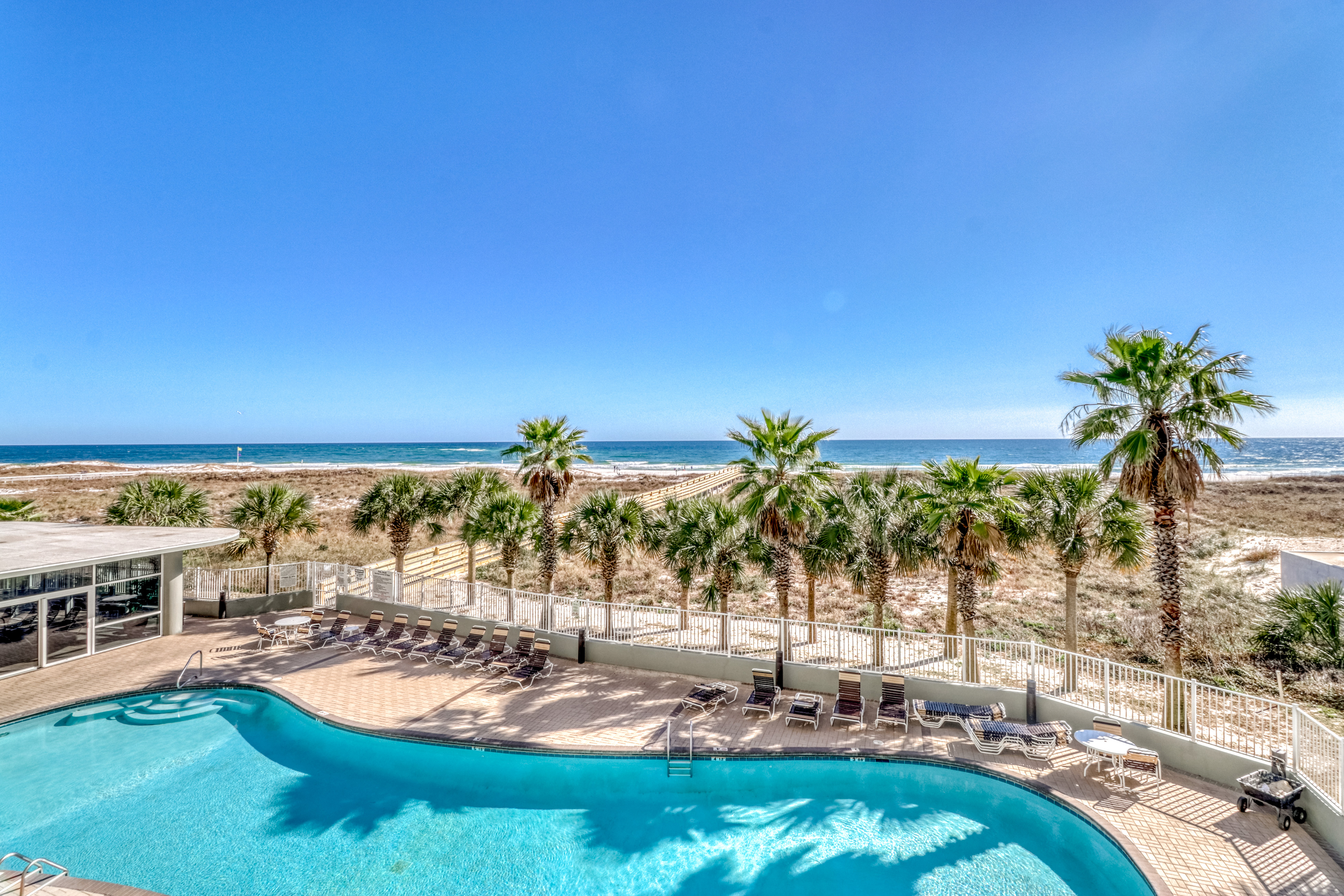A shot of the back pool area at a resort overlooking the ocean in Orange Beach, AL.