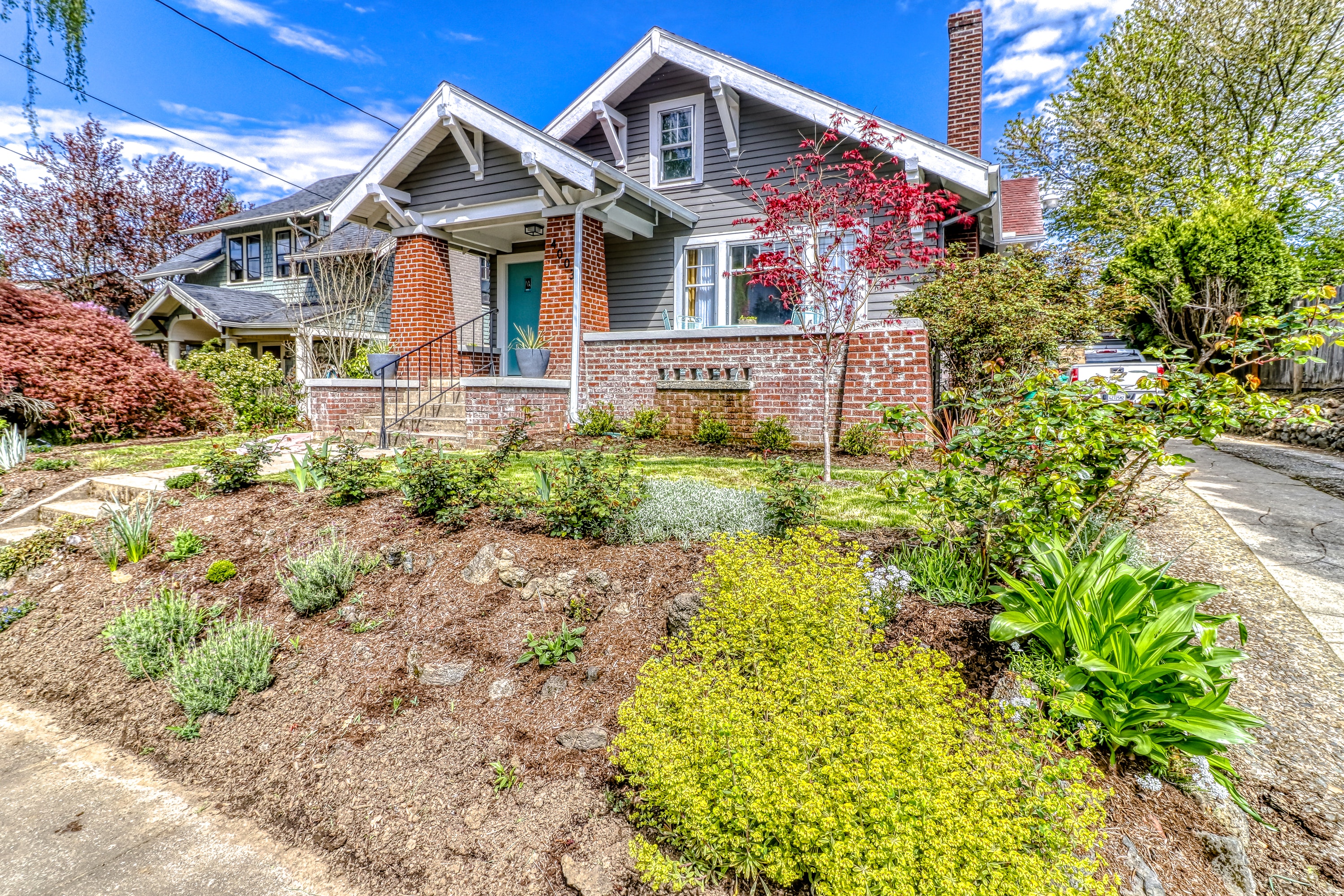 portland, oregon bungalow with brick columns on front porch