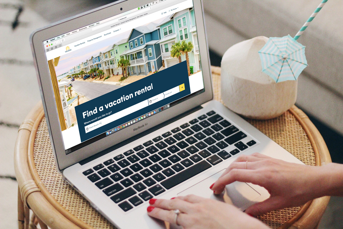 women booking a vacation rental with Vacasa on her laptop