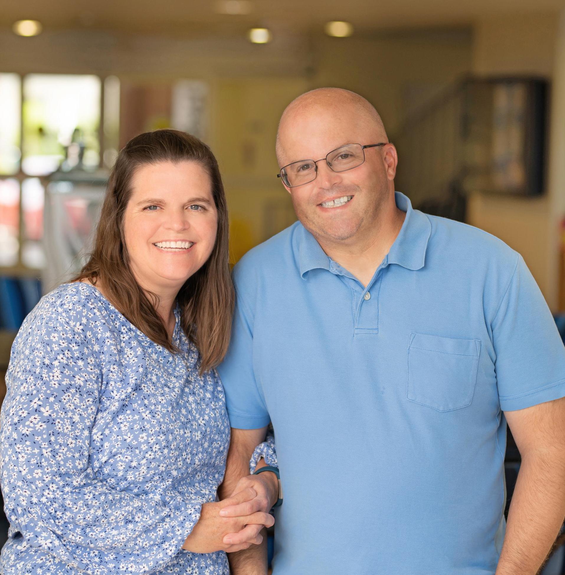 Couple smiling in a room