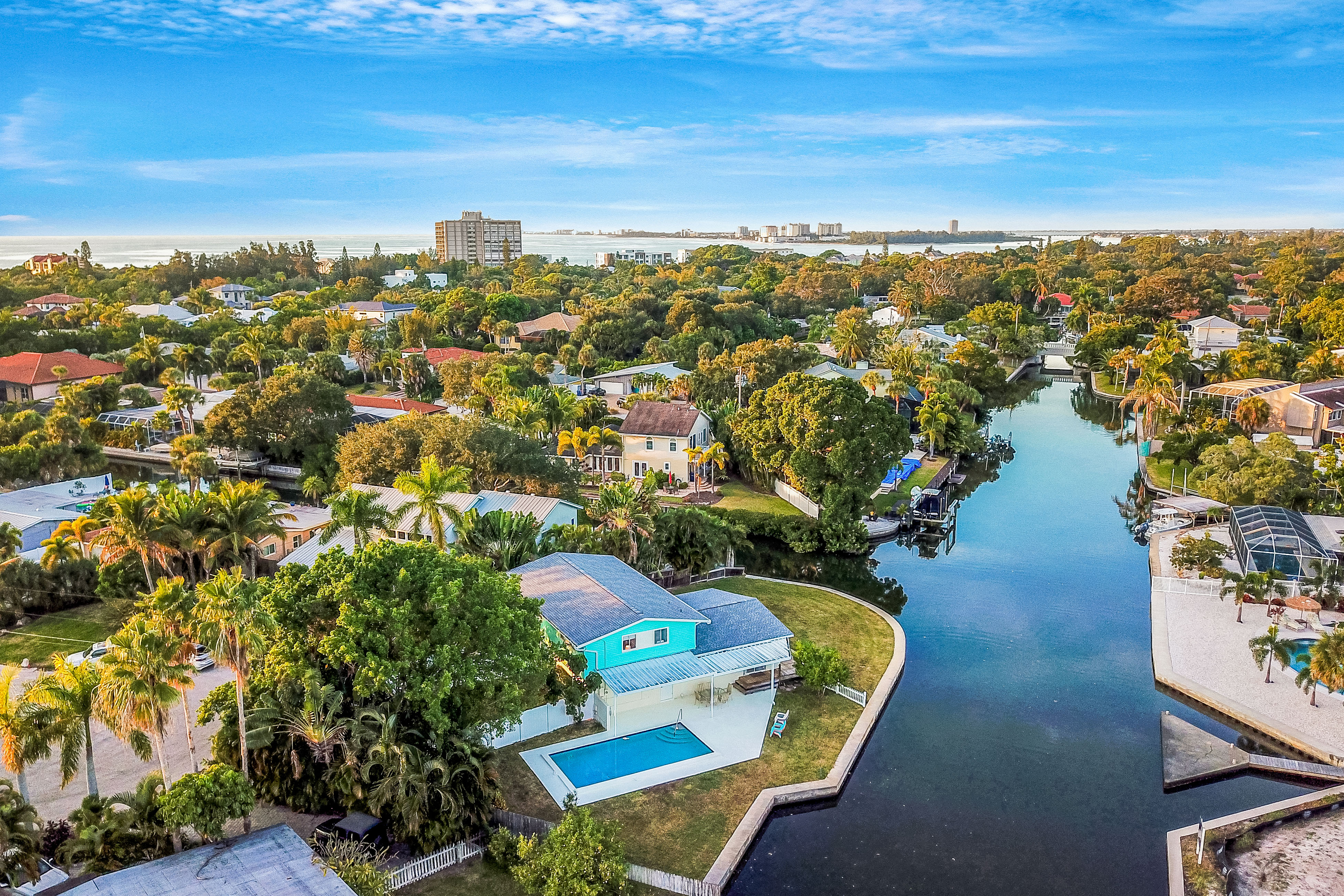 A drone shot of a canal overlooking Sarasota, FL.