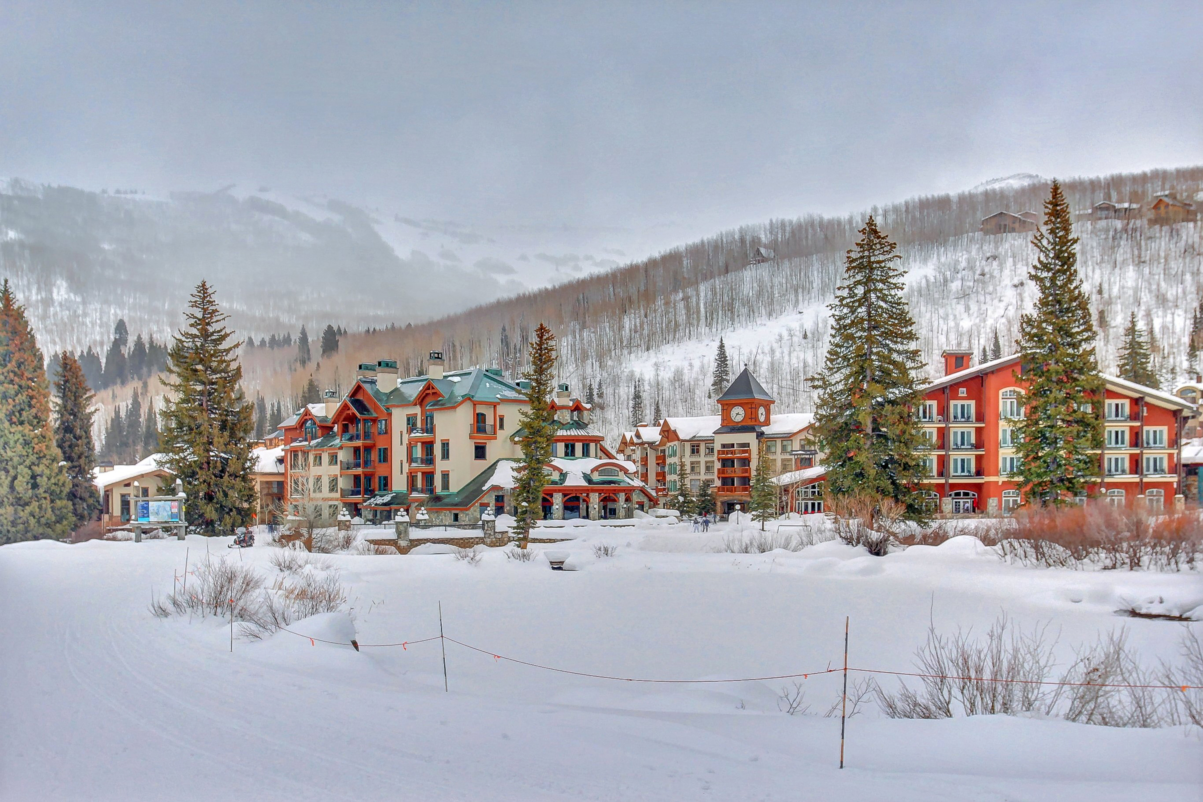 ski-in/ski-out condos surrounded by snowcapped mountains in solitude, utah