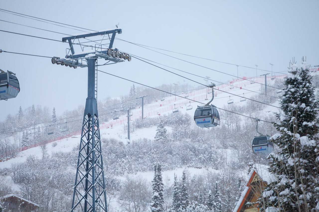 Gondola ski lifts on a snowy mountain in Steamboat Springs, CO
