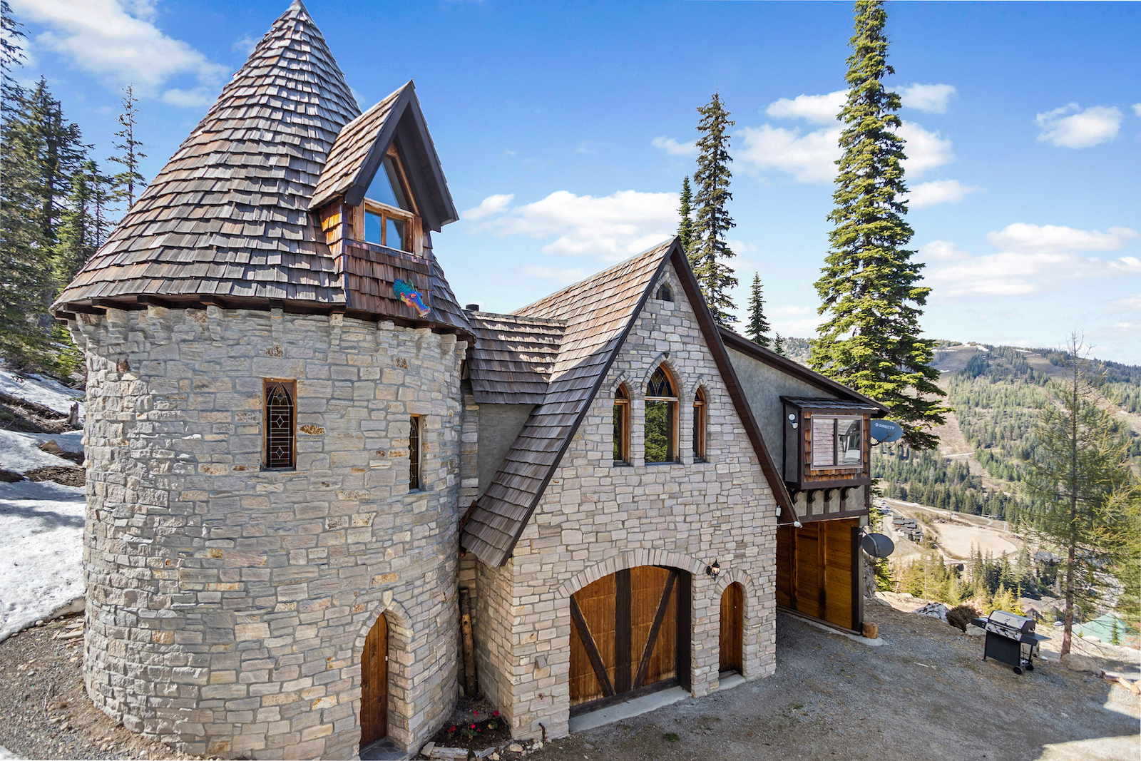 The exterior of a castle vacation rental in Sandpoint, Idaho.