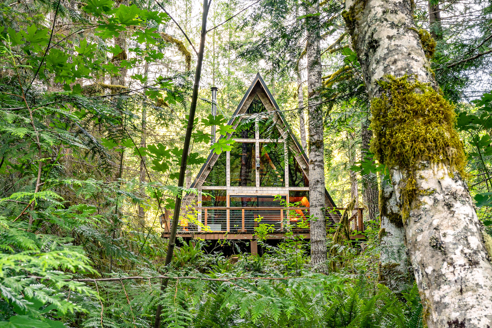 The exterior of an a-frame cabin rental in Rhododendron, OR.
