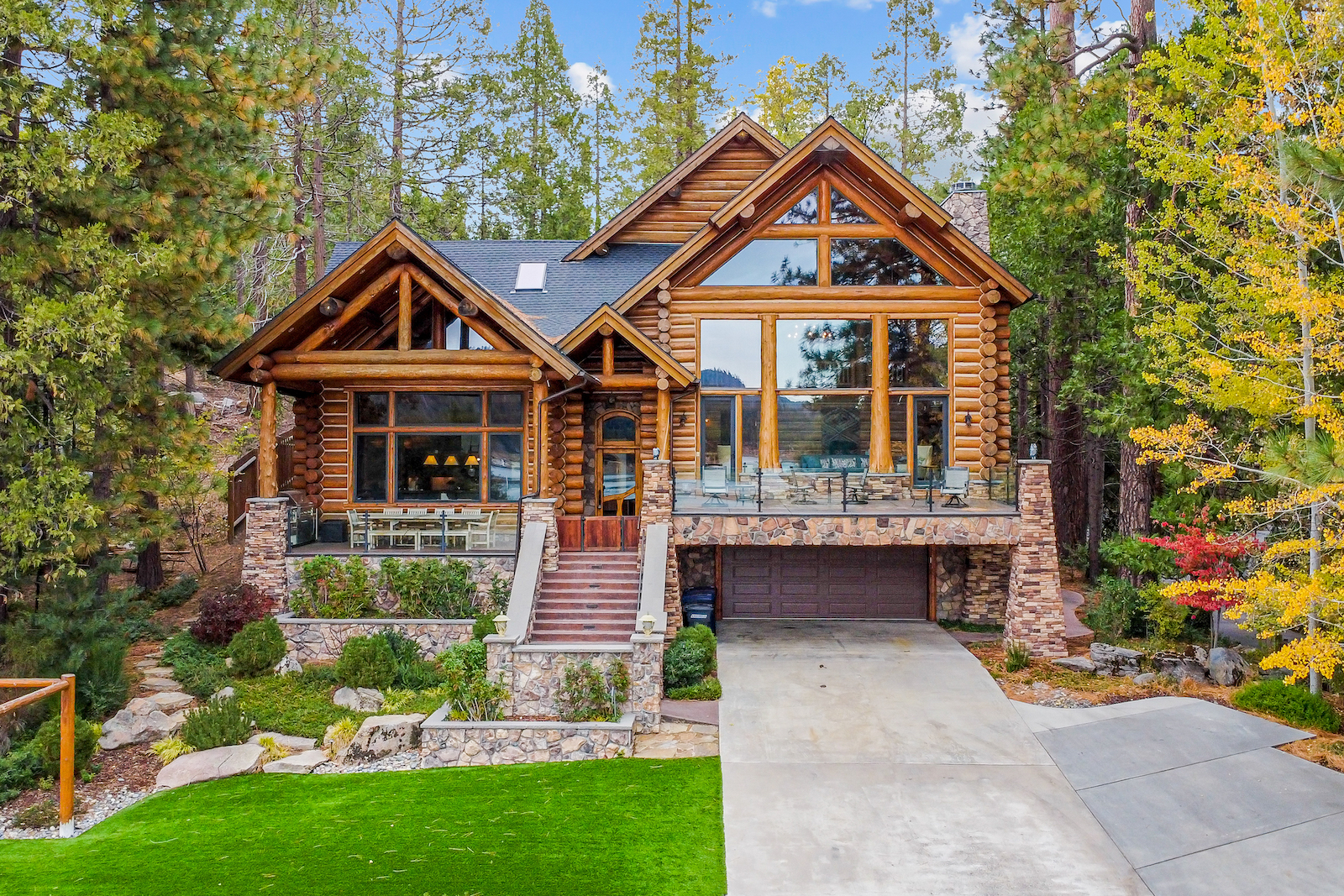 The exterior of a large cabin in Bass Lake, CA.
