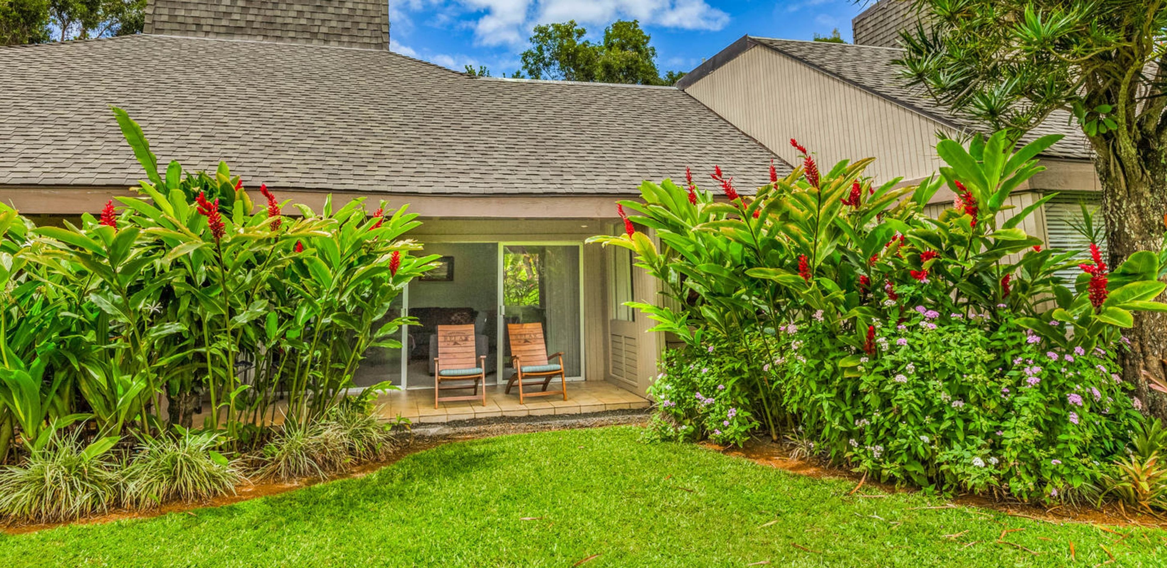 lush tropical vegetation surrounds vacation home