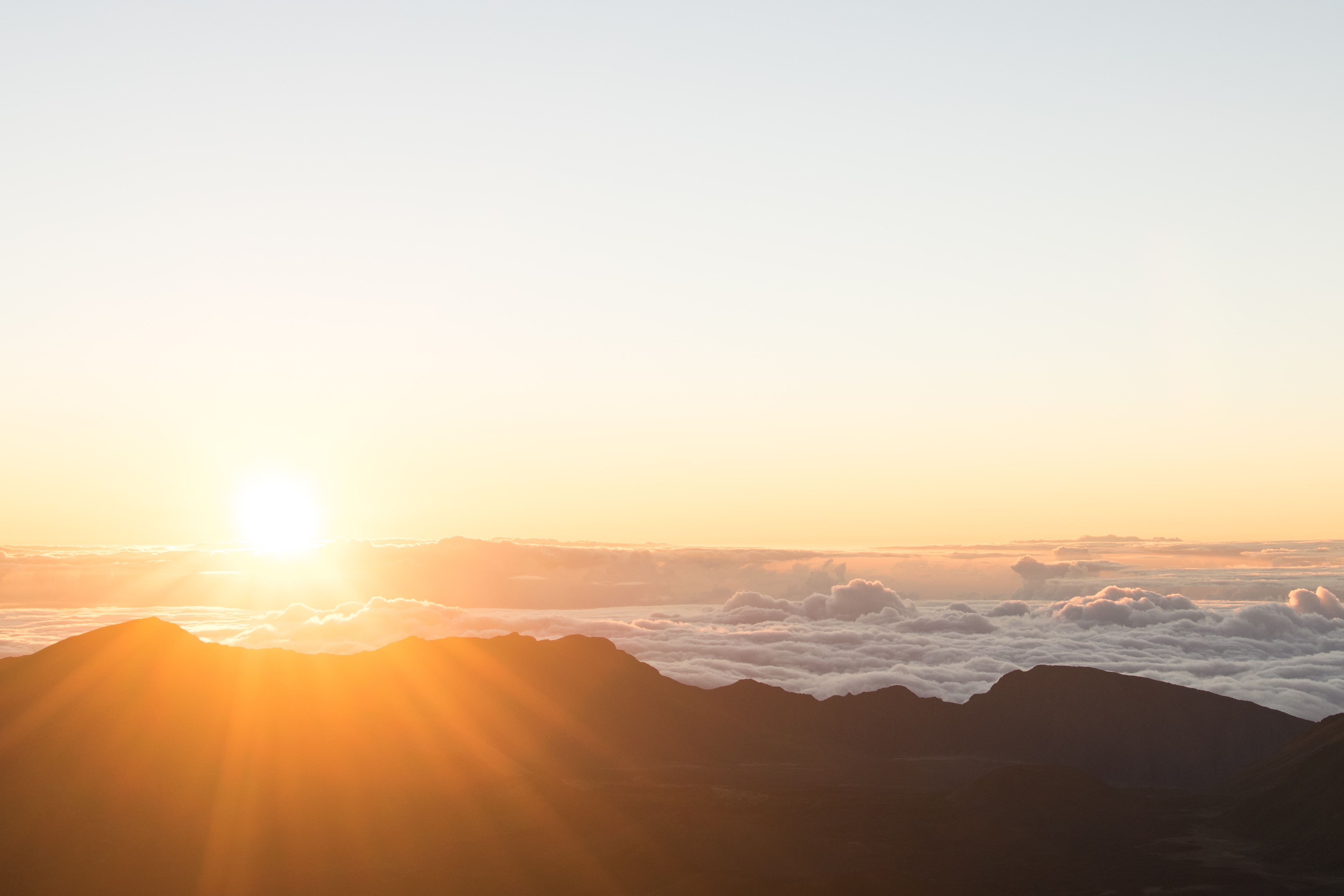 Sunrise over a large mountain range