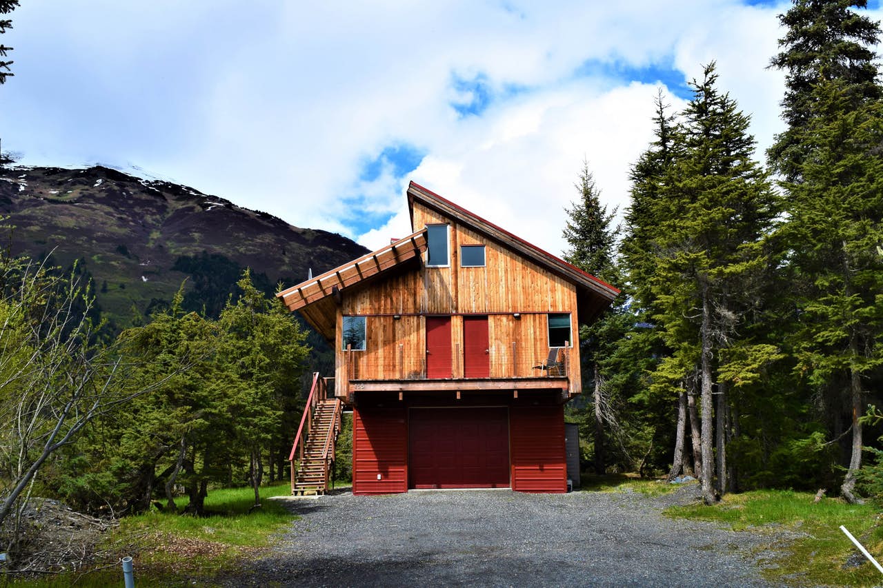 the unique architecture of a cabin in the woods of girdwood, alaska