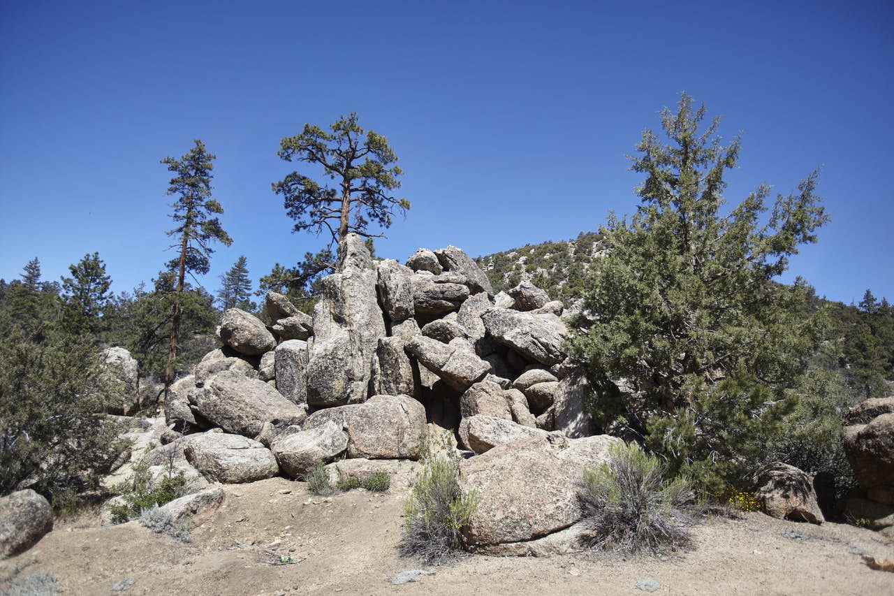 a rock formation near a trail in big bear