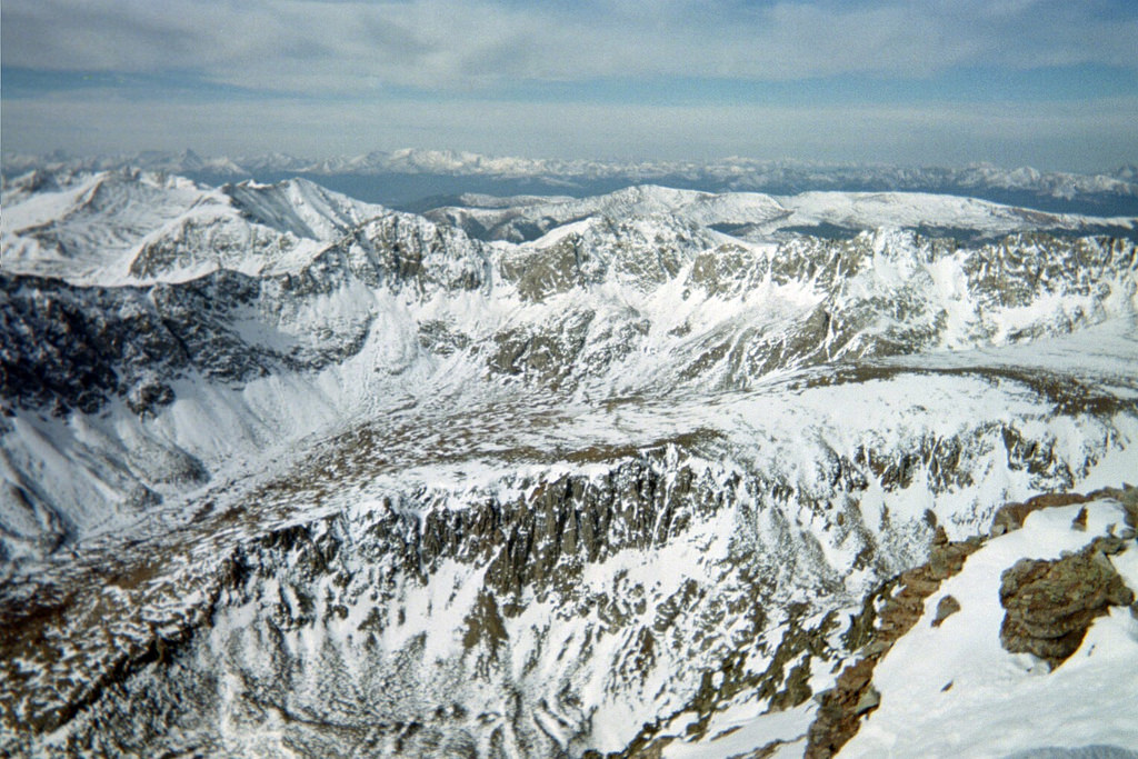 a view from the top of Quandary Peak summit on a winter day