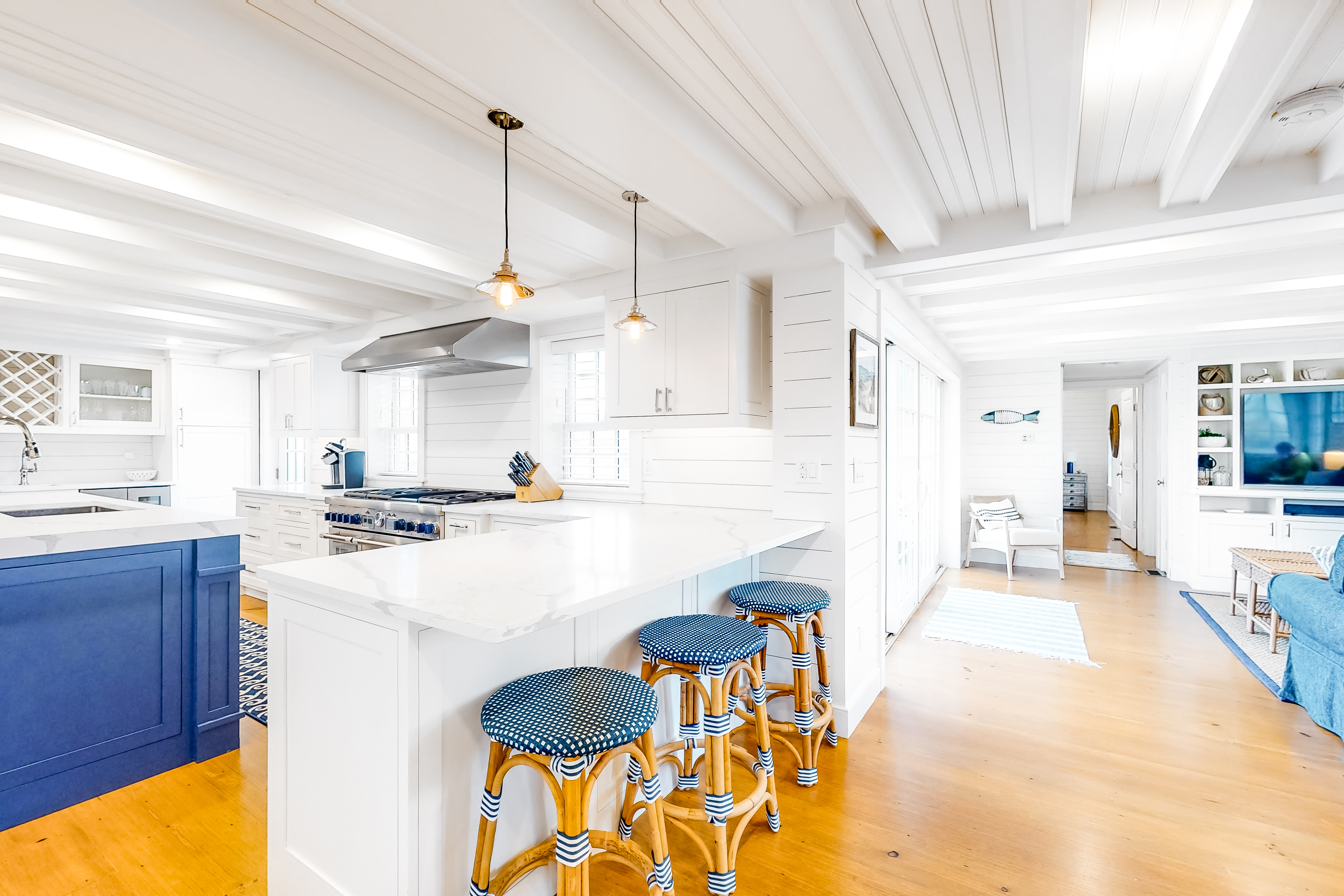 clean white kitchen with blue accents