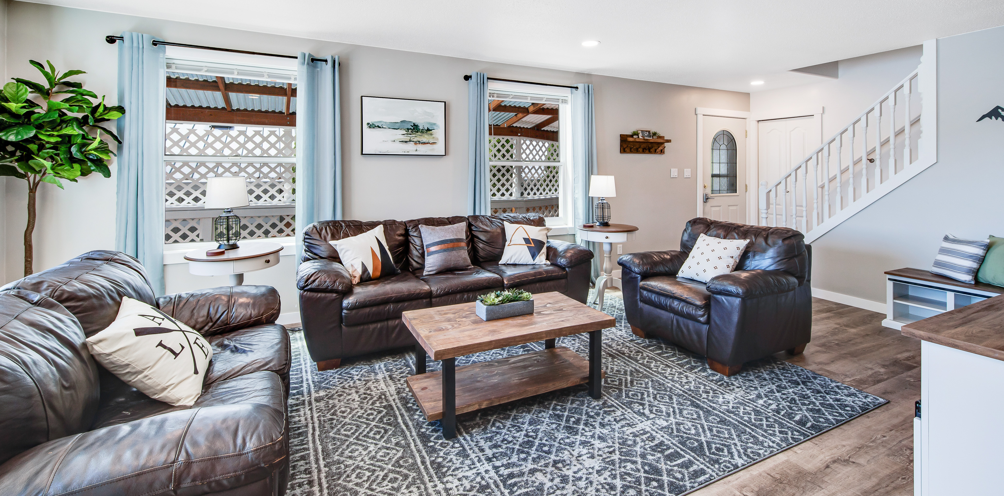 beautifully designed living room of lake home in black diamond, washington