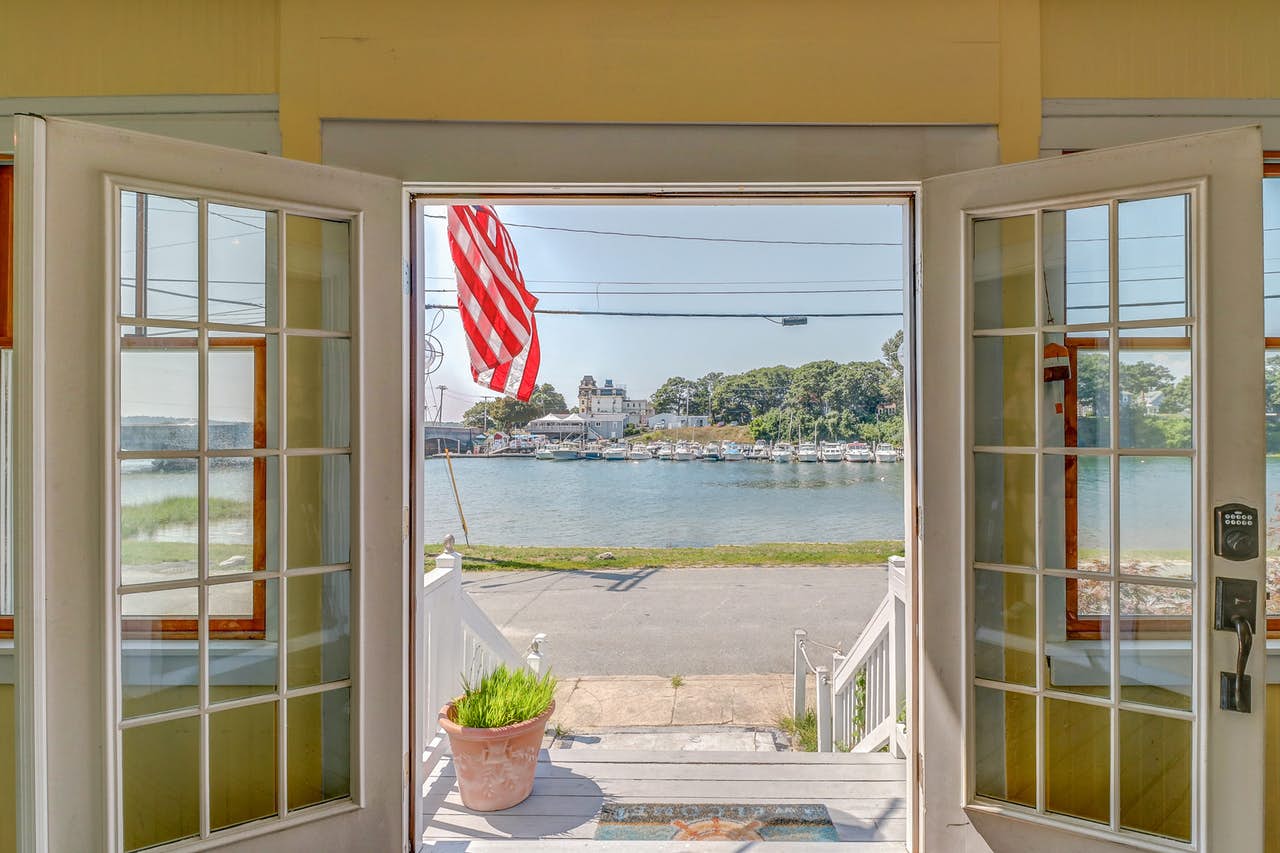 Waterfront view out of french doors from Cape Cod vacation rental