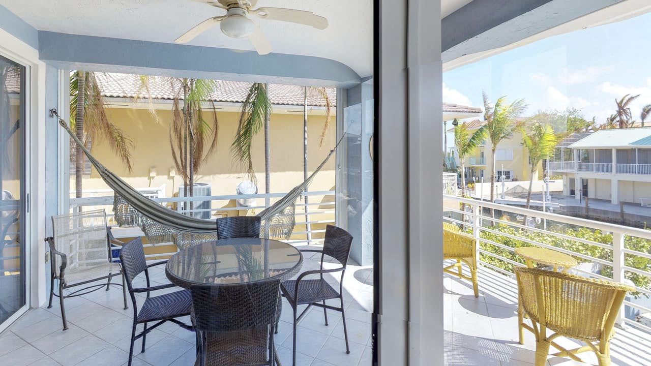 Vacation rental with patio area with hammock and canal views in Key Largo, FL