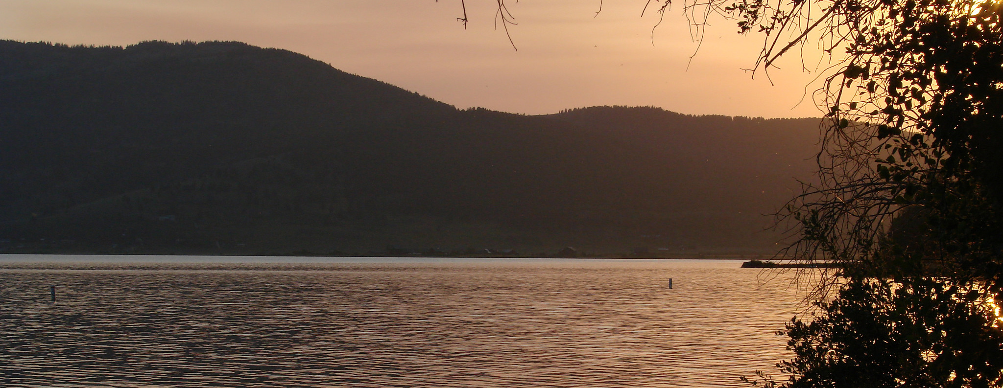 sun setting over a lake in idaho