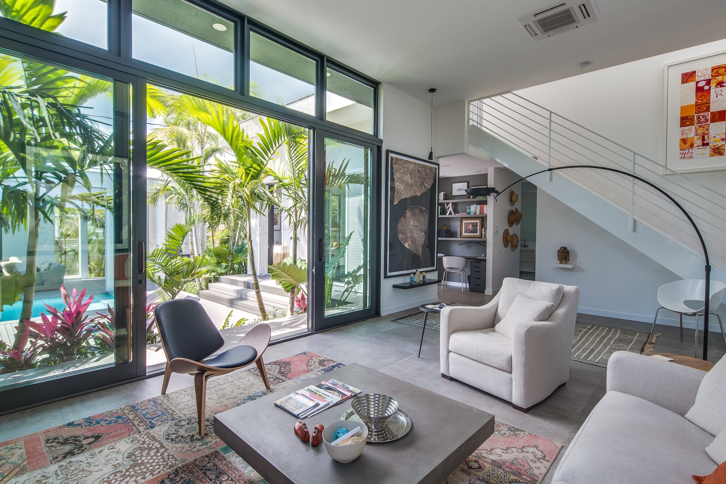 Living area of Key West, FL vacation rental with view of private pool