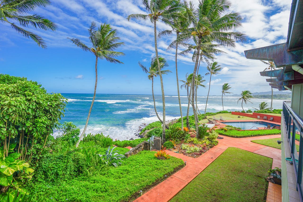 View of beach and ocean from oceanfront vacation rental in Kauai