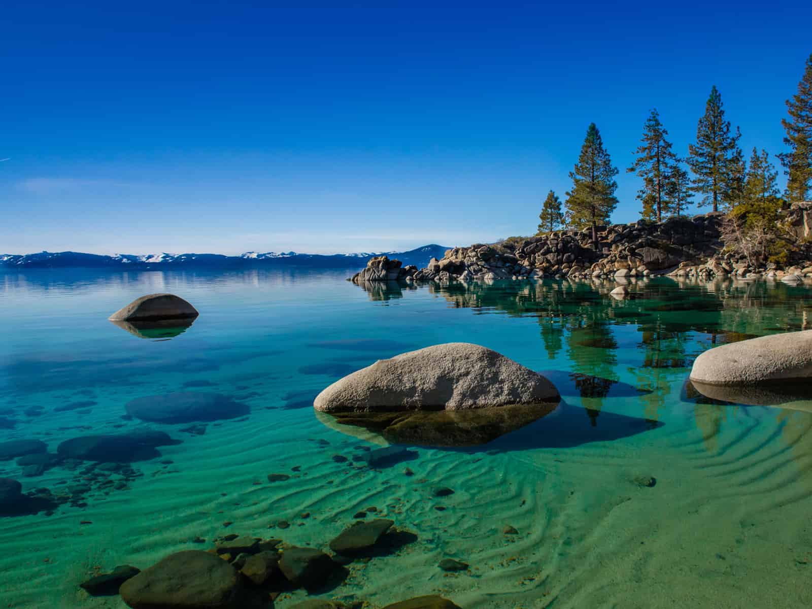 Clear blue water and surrounding landscape at Lake Tahoe
