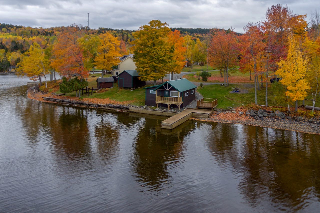 Lakefront cabin rental with a dock in Maine