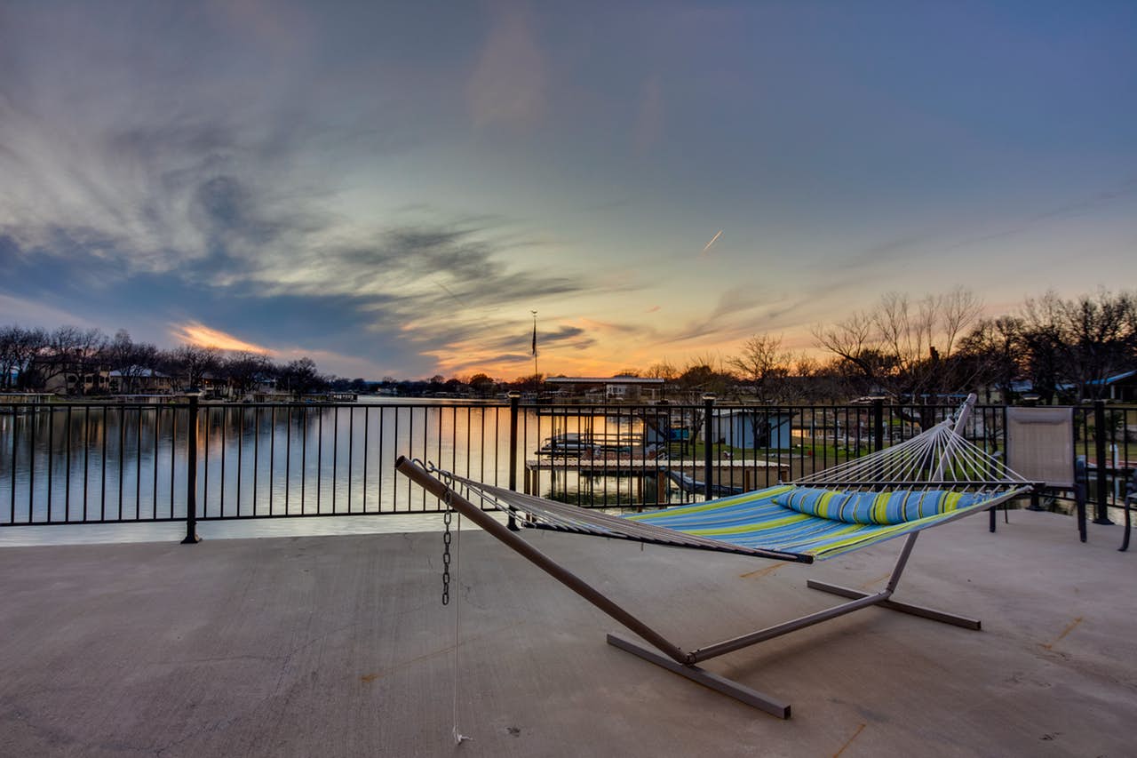 Hammock outside a Texas vacation rental with lakefront views