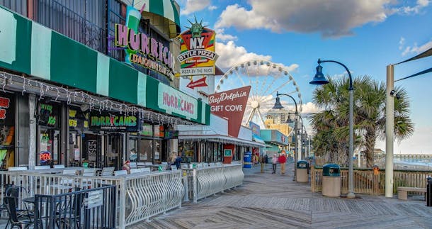 What to do in Myrtle Beach: boardwalk with storefronts in myrtle beach
