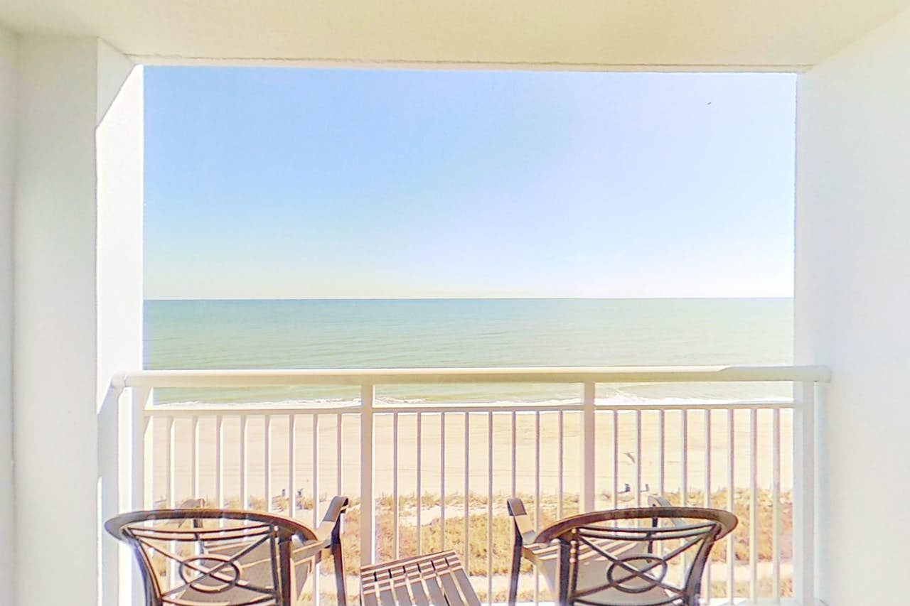 balcony of condo rental inside Camelot by the Sea