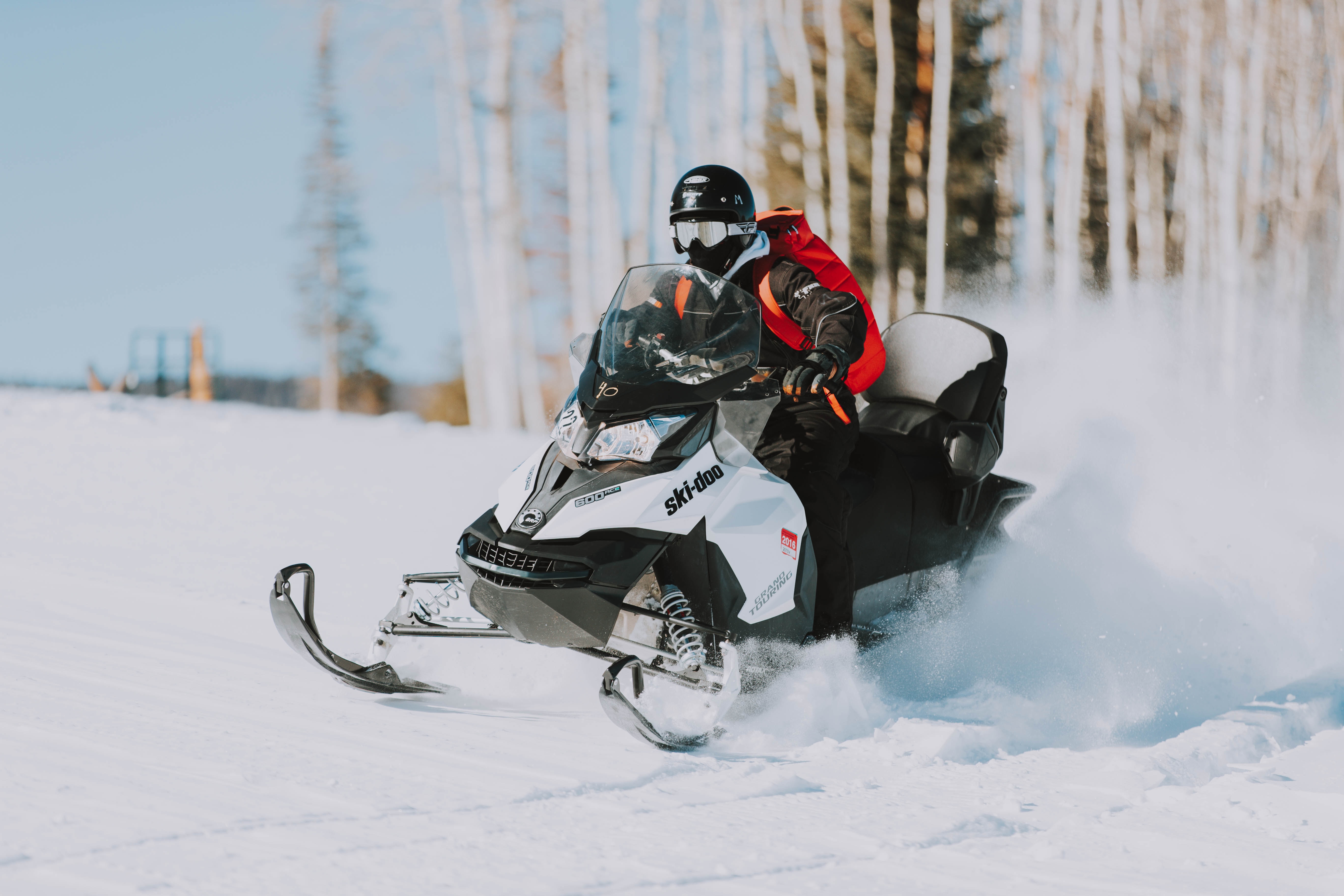 A man on a snowmobile.