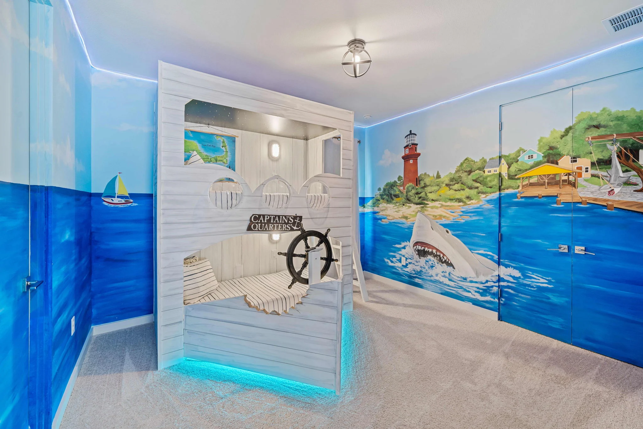 A charming captains quarter themed room for kids at a vacation rental in Florida.