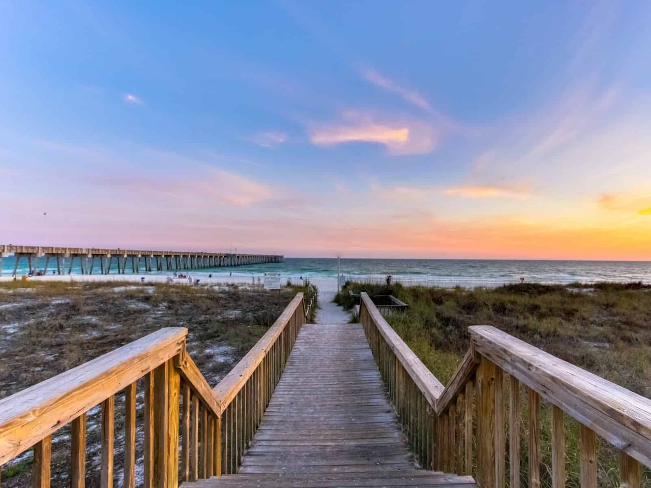Boardwalk leading toward the beach in Panama City Beach, FL