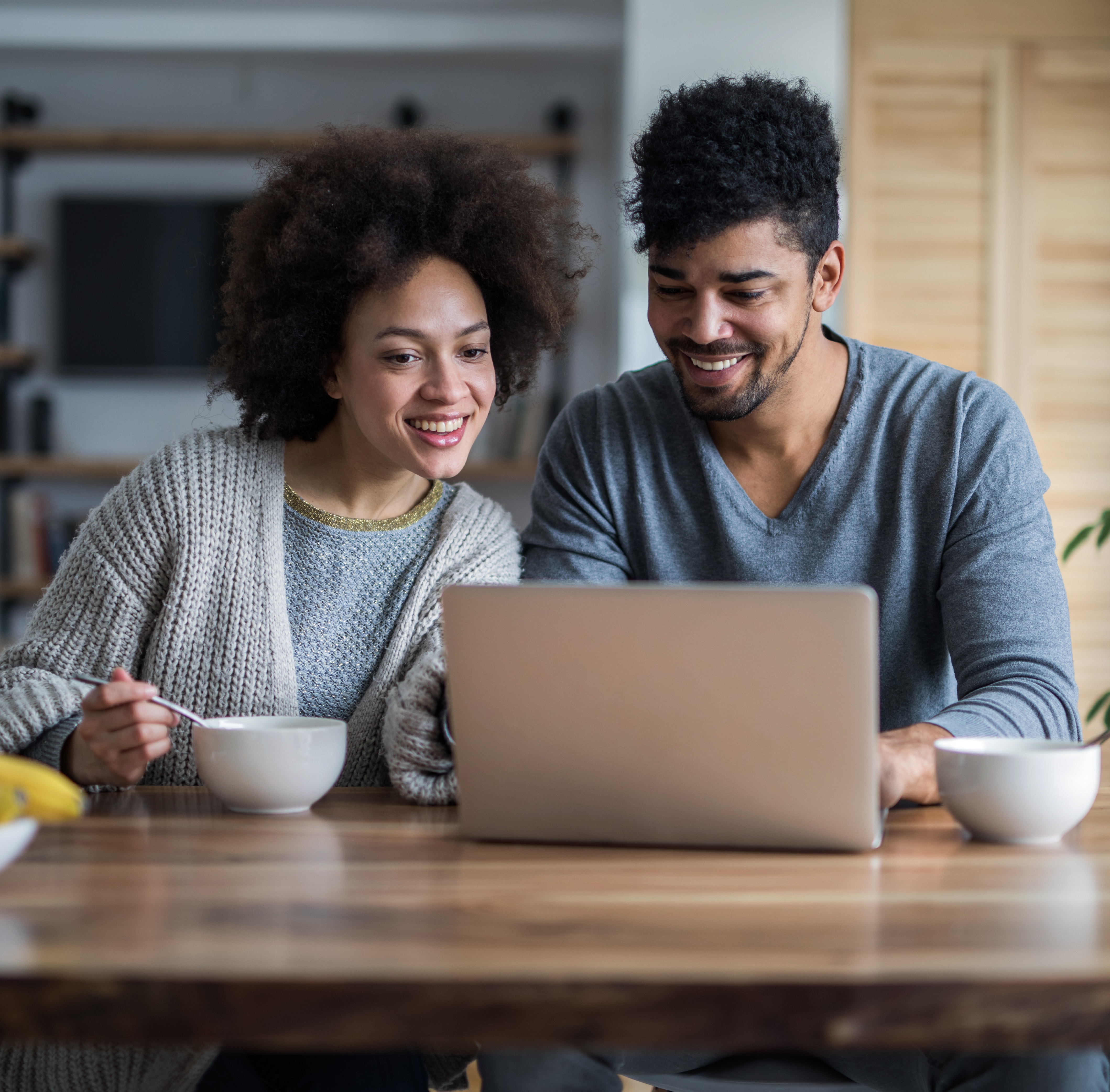 Couple at a computer.