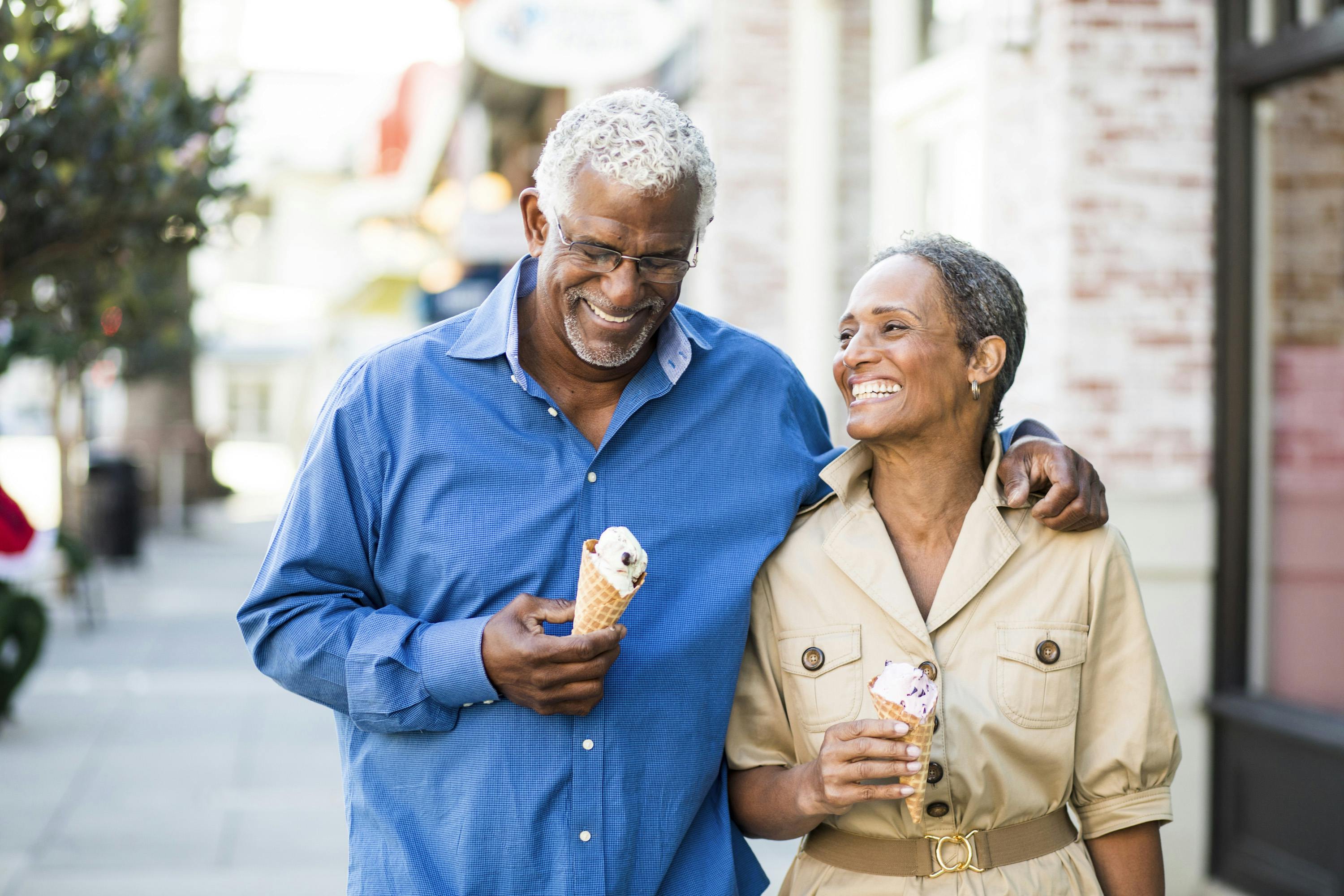 An older couple enjoying ice cream