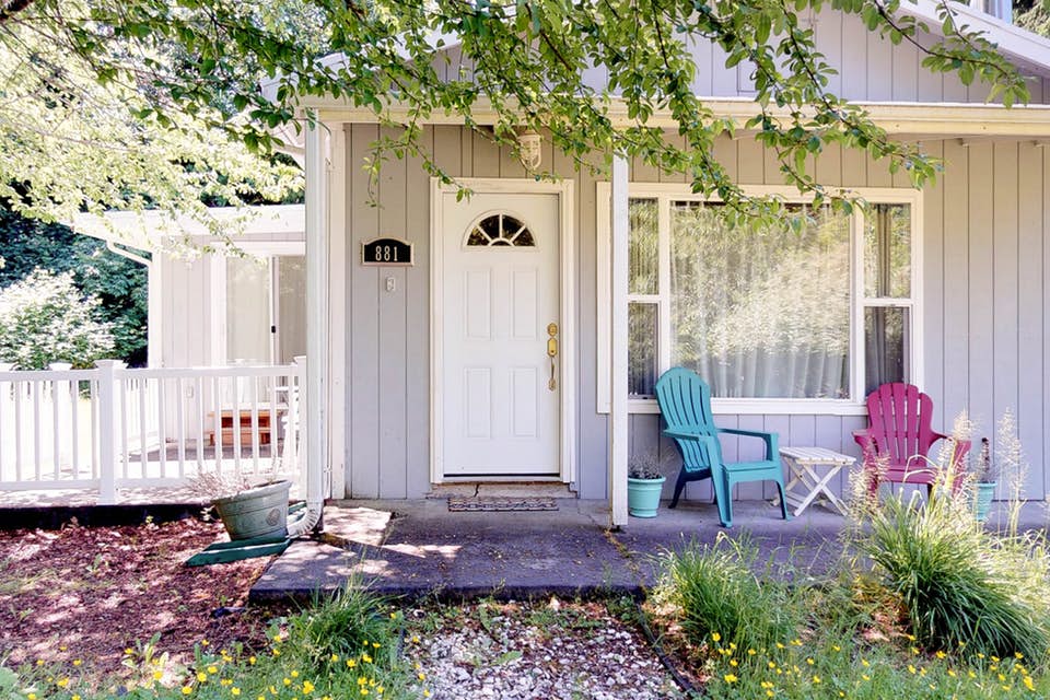 the front porch of a coastal cottage in westport, wa