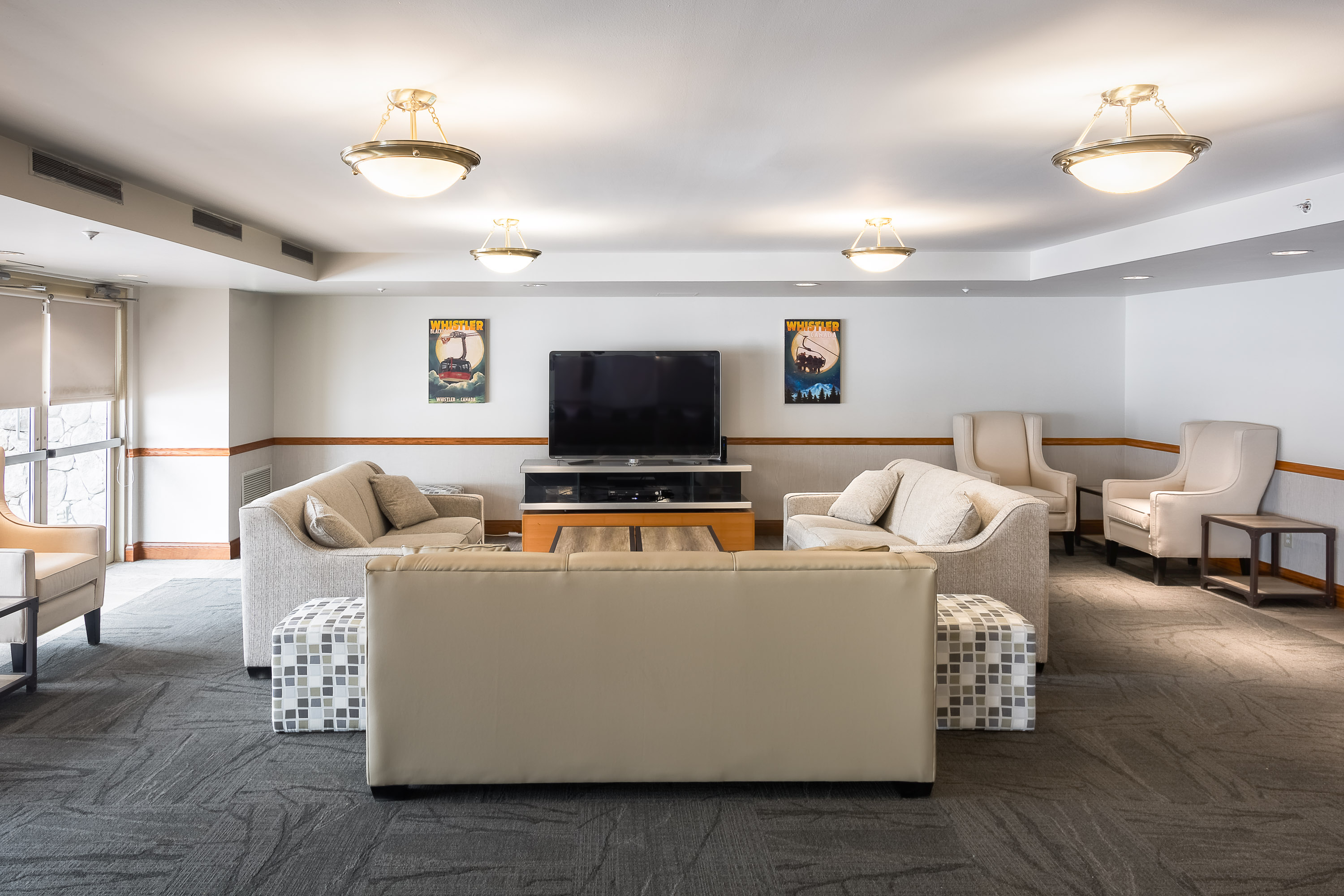 meeting room couches and tv in whistler property